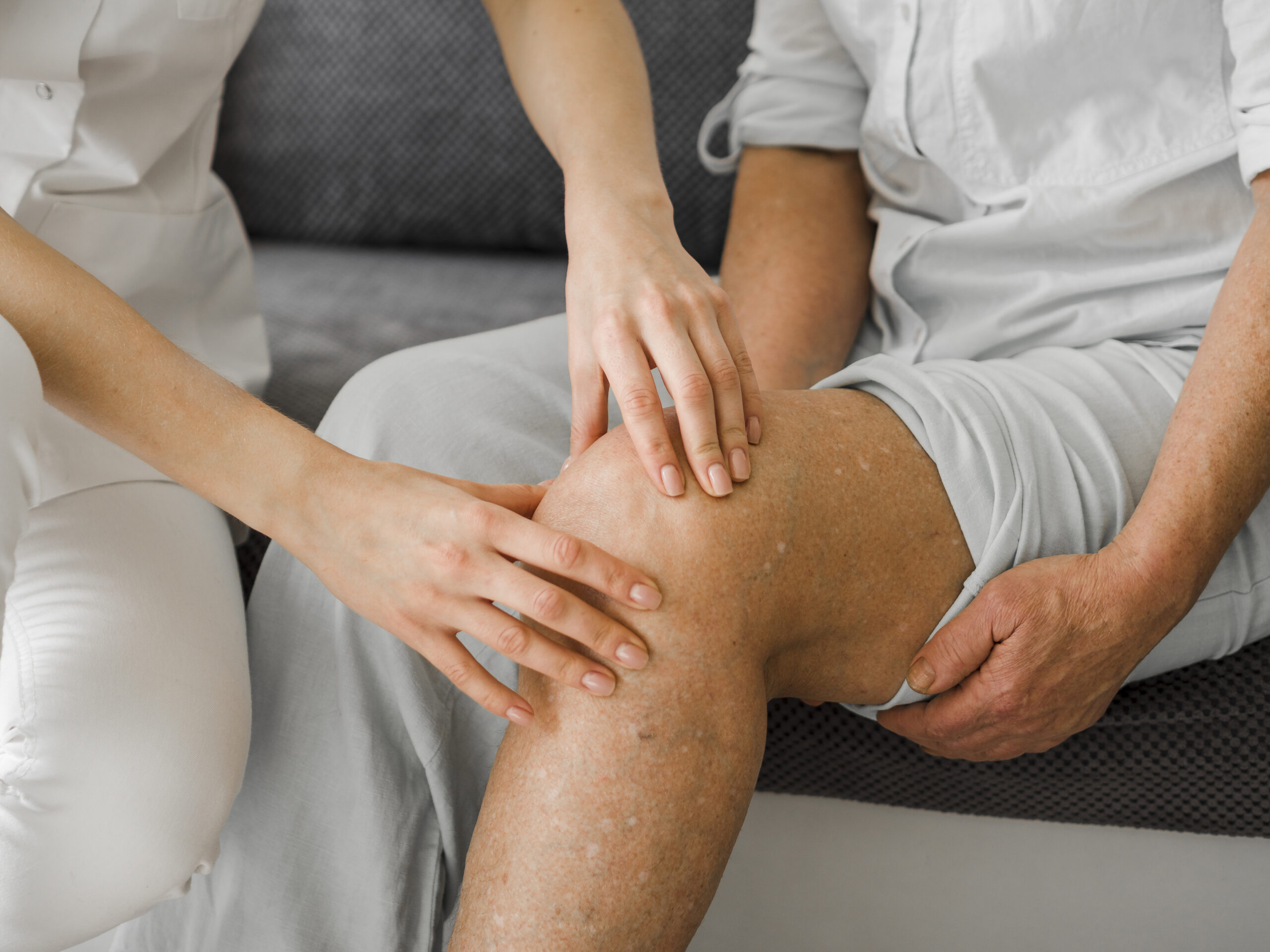 Doctor checking varicose veins